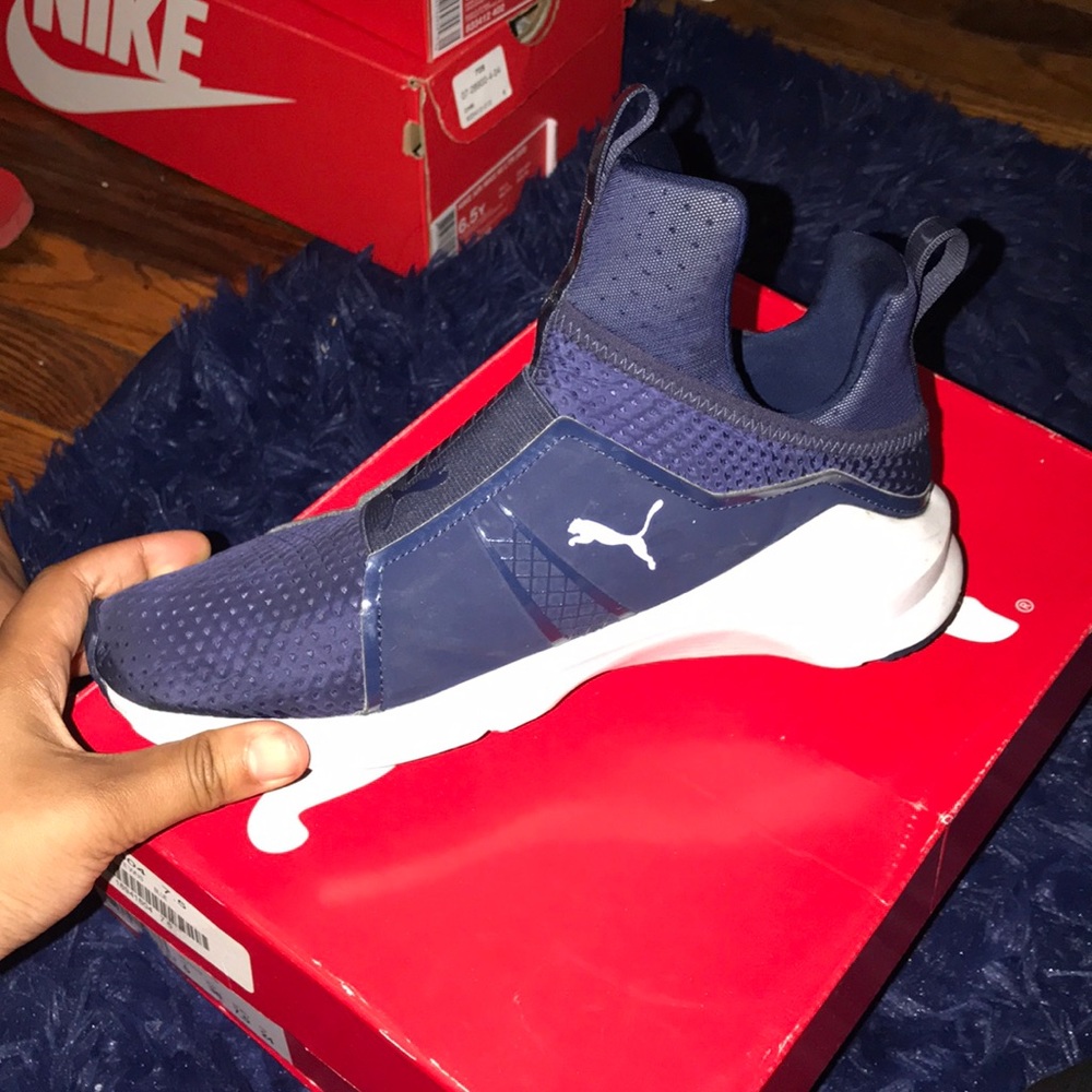 Blue and white pumas
